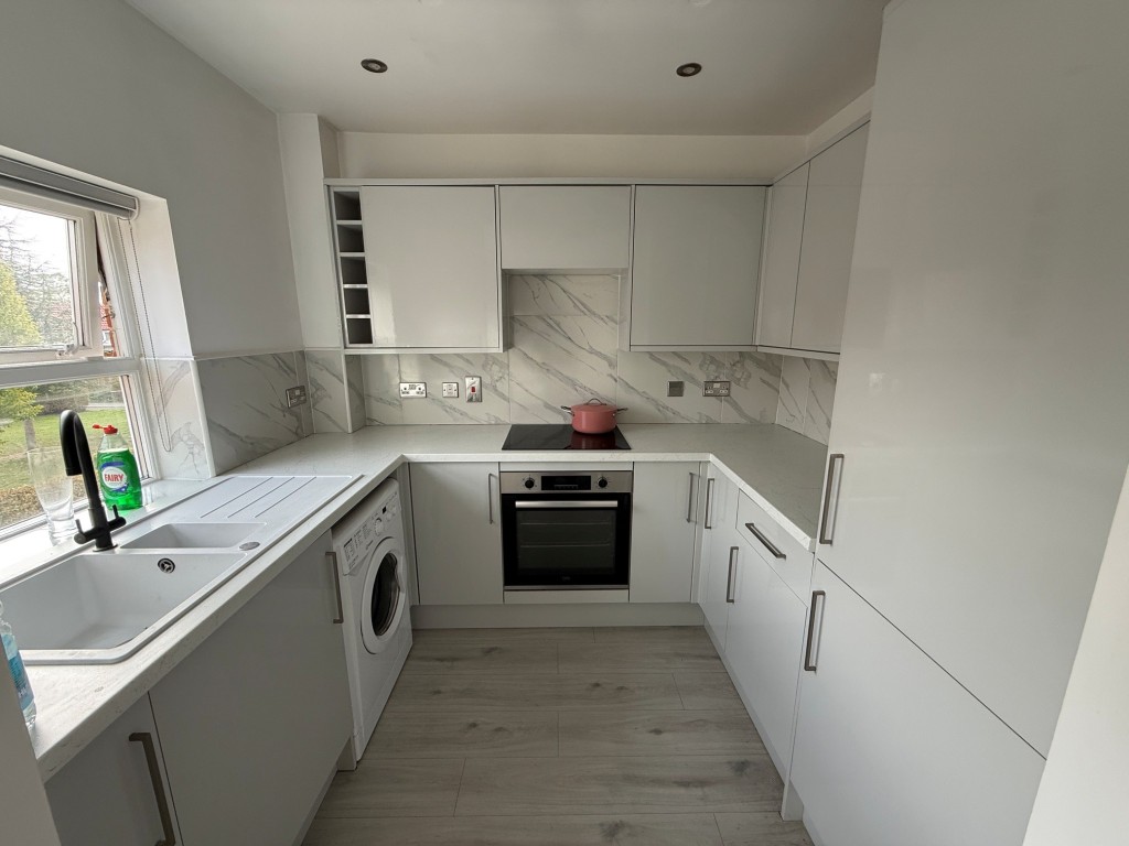 Lot: 64 - THREE-BEDROOM SPLIT LEVEL MAISONETTE - Fitted kitchen with space for appliances